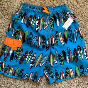 NWT Boys first wave swim trunks size 6-7
